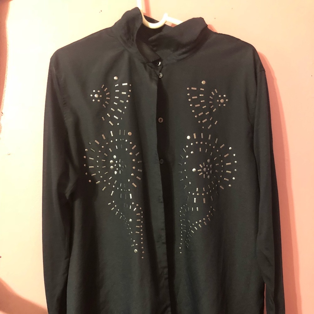 A long sleeve, navy blue blouse